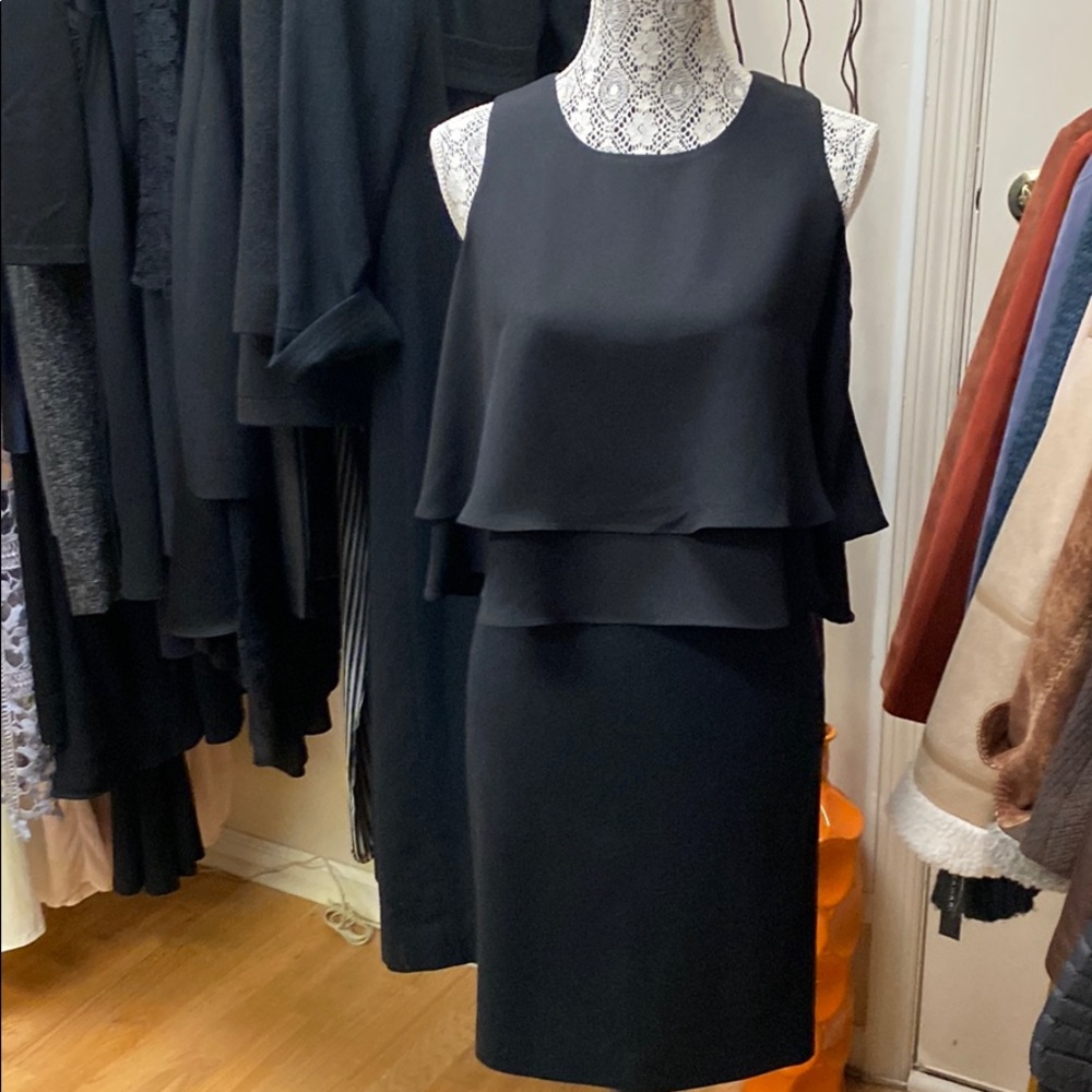 Sleeveless shirt and pencil skirt